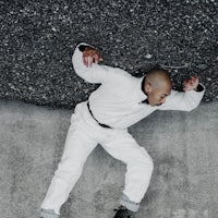 a man on a skateboard on a concrete surface